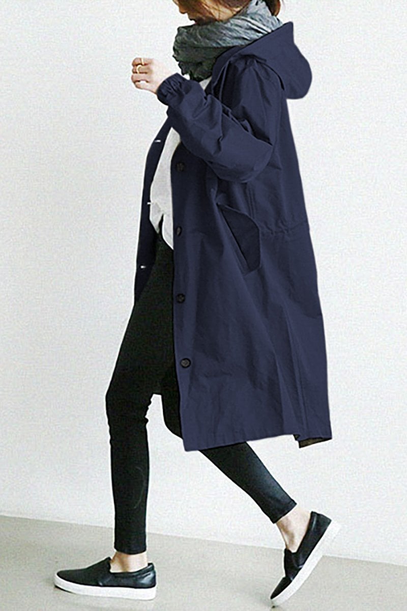Gabardina impermeable con cierre frontal cubierto para mujer