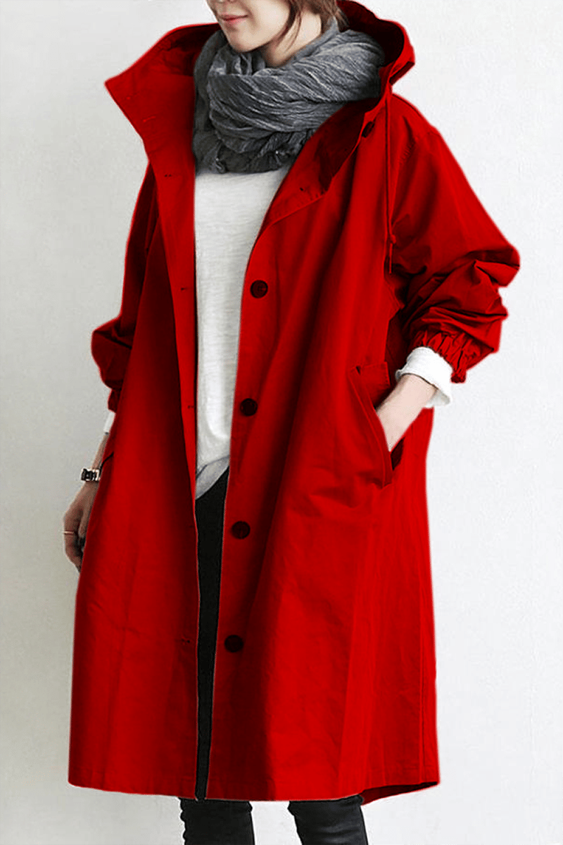 Vista trasera del trench impermeable entallado para mujer