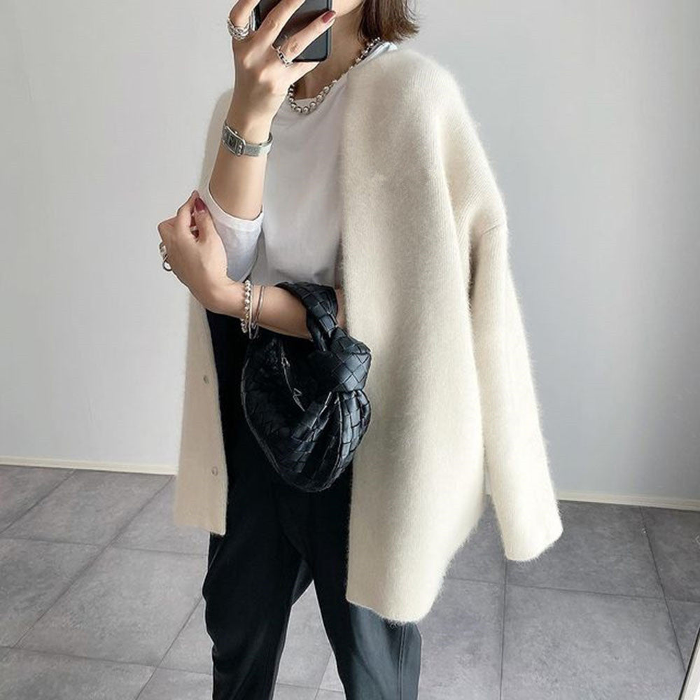 Chaqueta de punto oversize para mujer combinada con vestido