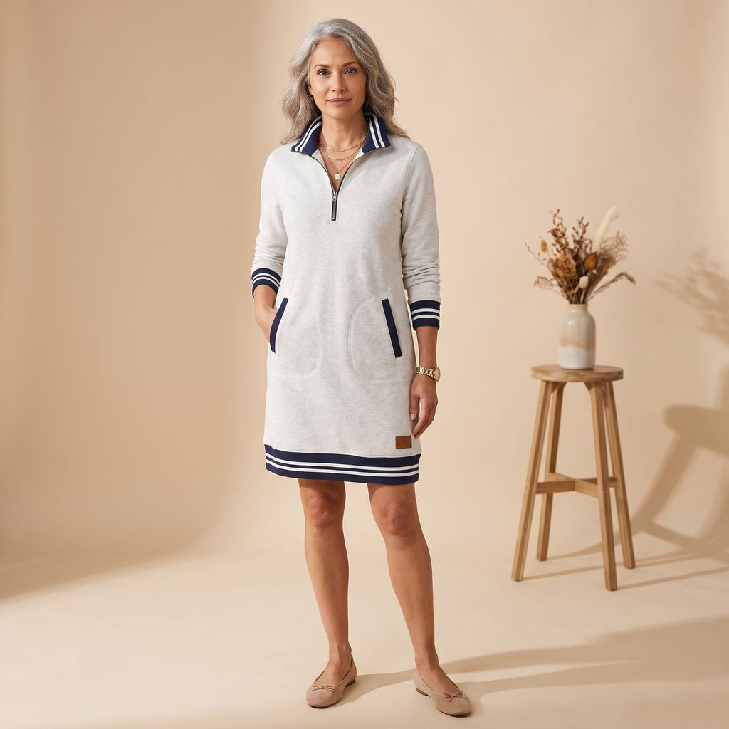 Vestido midi combinado con ankle boots para un look elegante