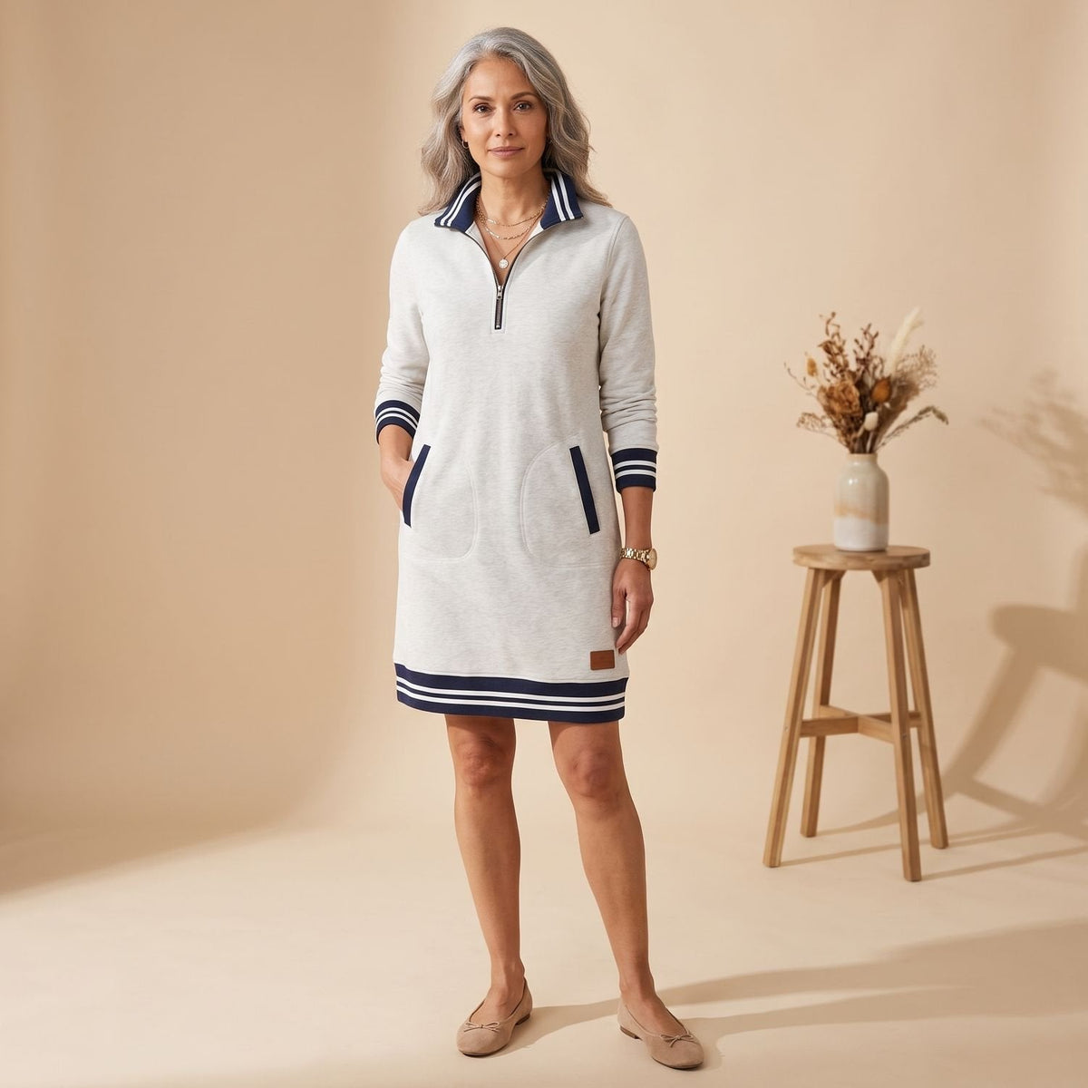 Vestido midi combinado con ankle boots para un look elegante