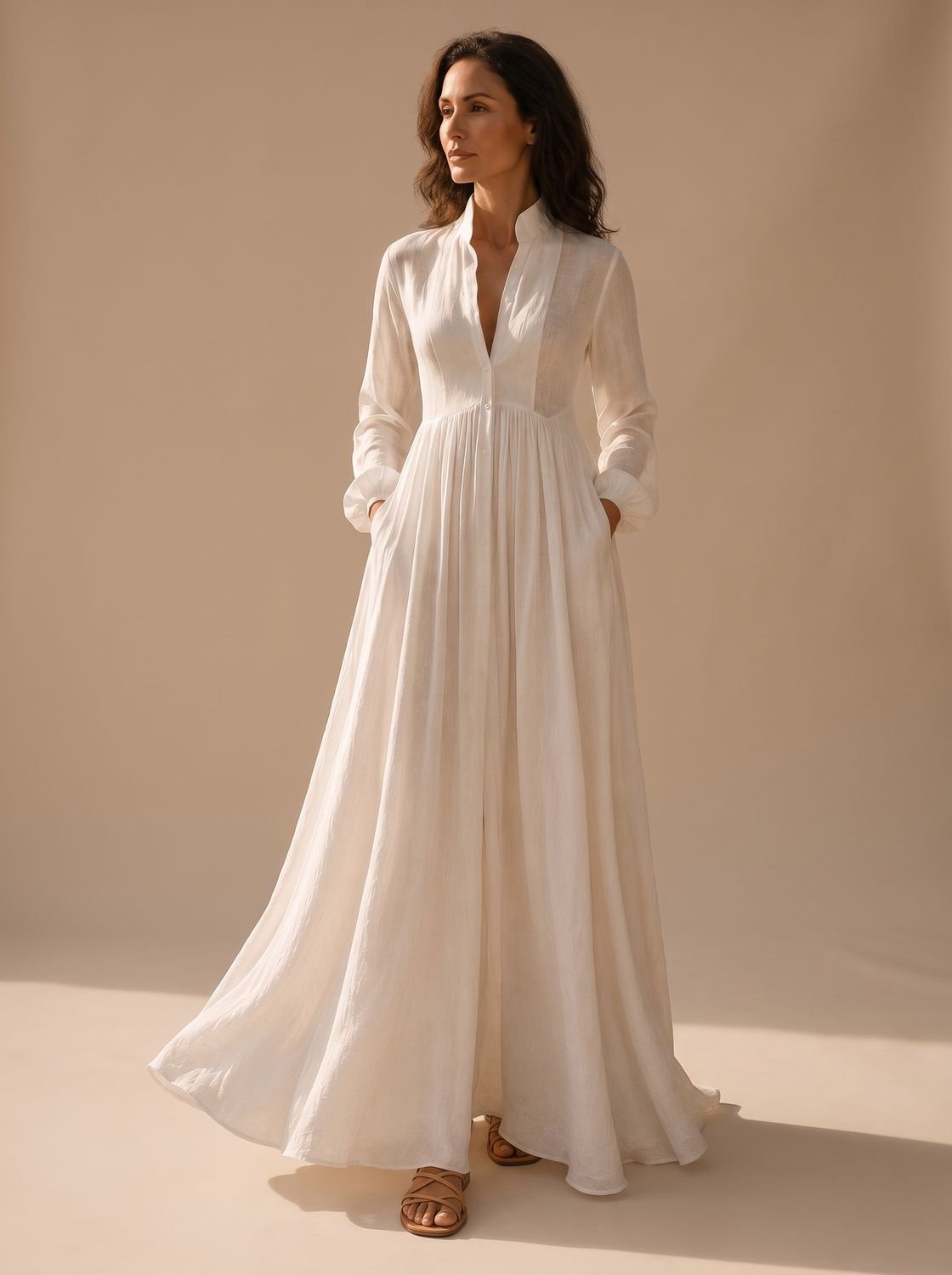 Mujer con vestido largo de lino manga larga y escote en V estilo boho