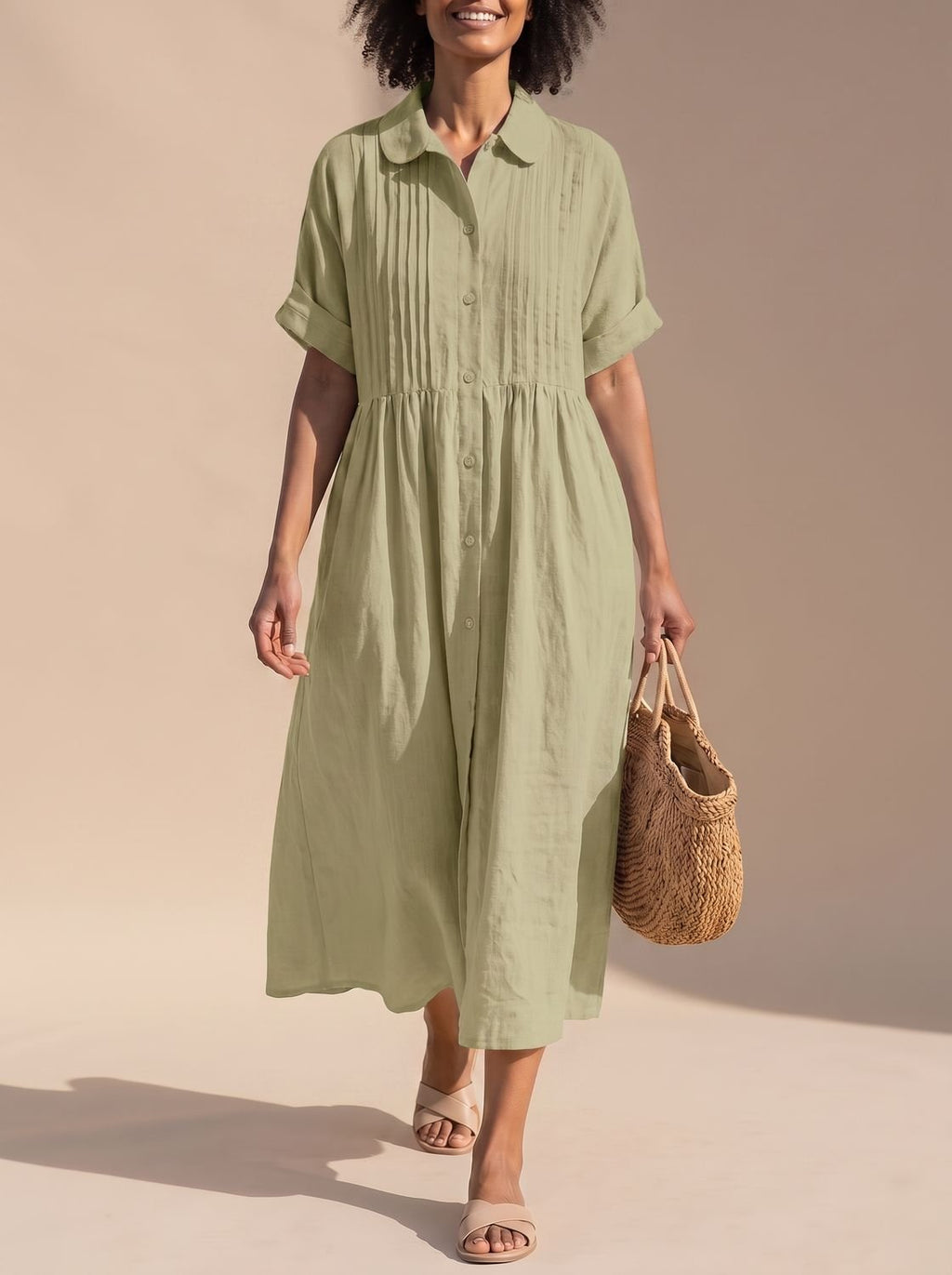 Vista trasera del vestido camisero midi de algodón con botones frontales