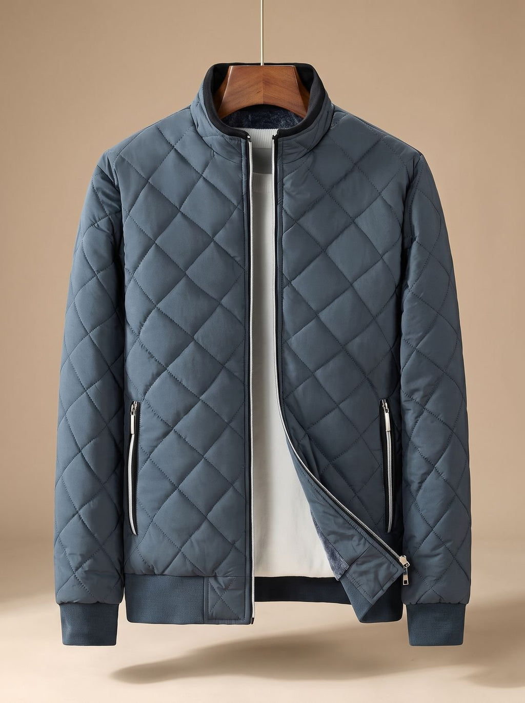 Cazadora bomber acolchada de hombre en color gris con cremallera integral