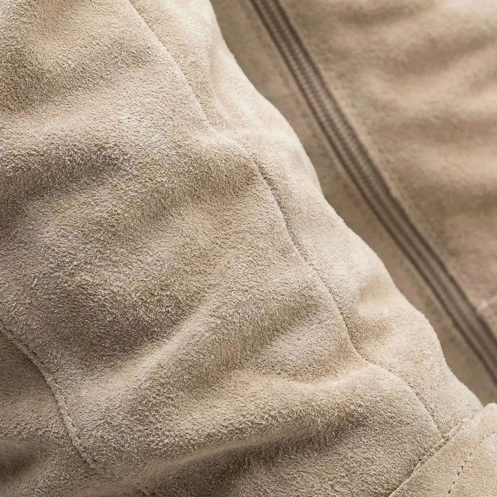 Botas altas de mujer estilo slouch en tono neutro